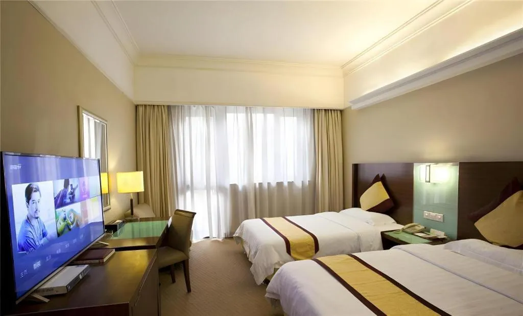 Bed in Carrianna Hotel