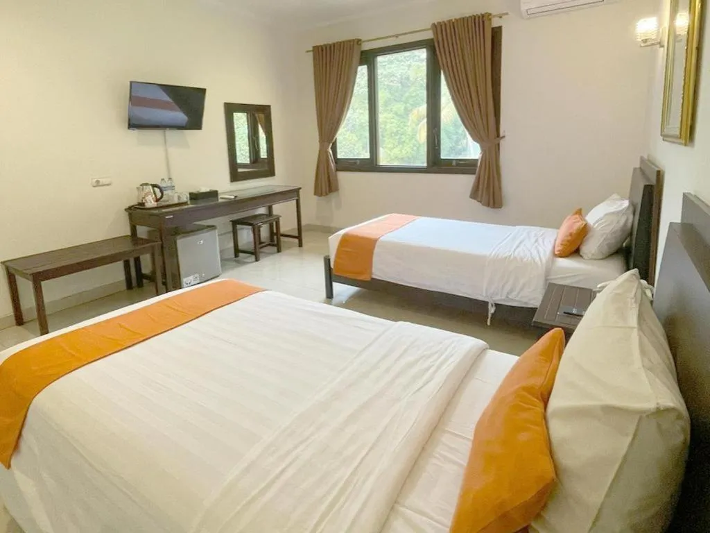 Bed in Ole Suite Hotel and Cottage