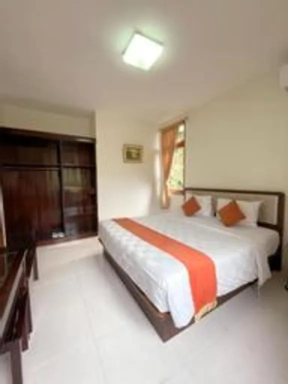 Bed in Ole Suite Hotel and Cottage