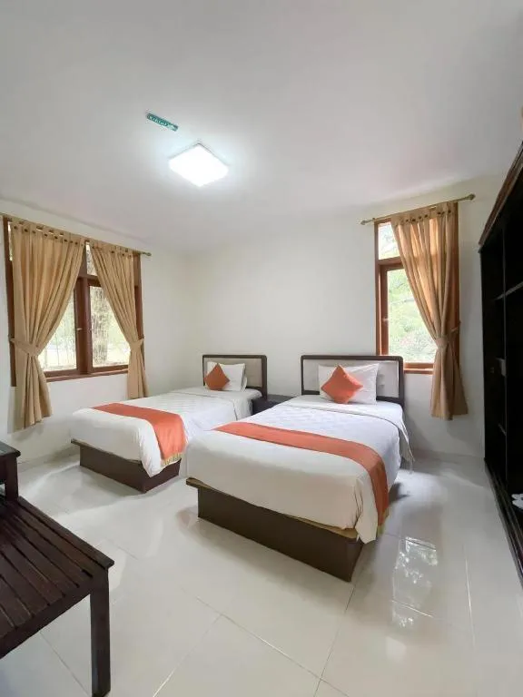 Bed in Ole Suite Hotel and Cottage