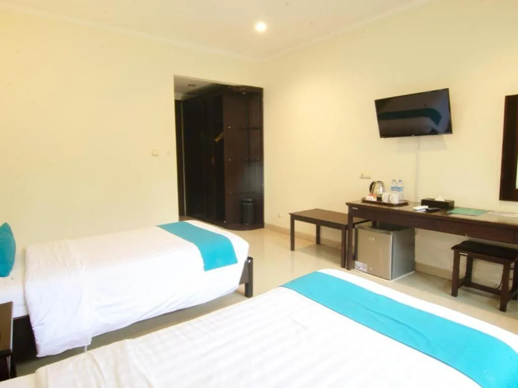 Bed in Ole Suite Hotel and Cottage