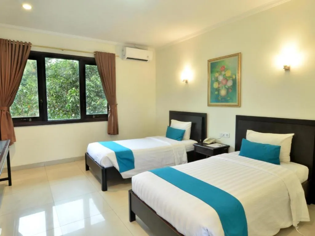 Bed in Ole Suite Hotel and Cottage