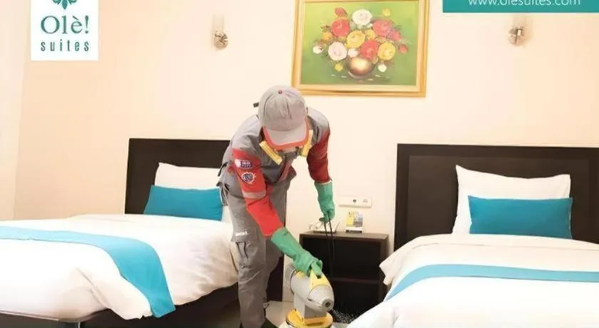 Bed in Ole Suite Hotel and Cottage