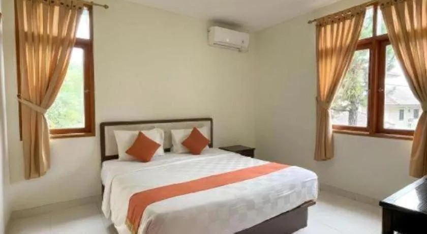 Bed in Ole Suite Hotel and Cottage