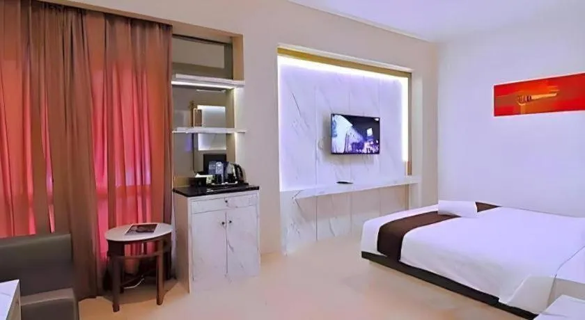 Bed in Grand Malioboro Yogyakarta