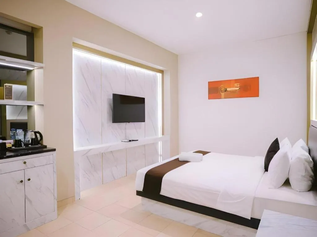 Bed in Grand Malioboro Yogyakarta