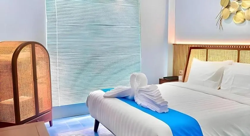 Bed in Grand Malioboro Yogyakarta