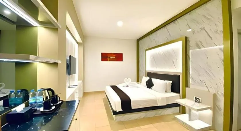 Bed in Grand Malioboro Yogyakarta