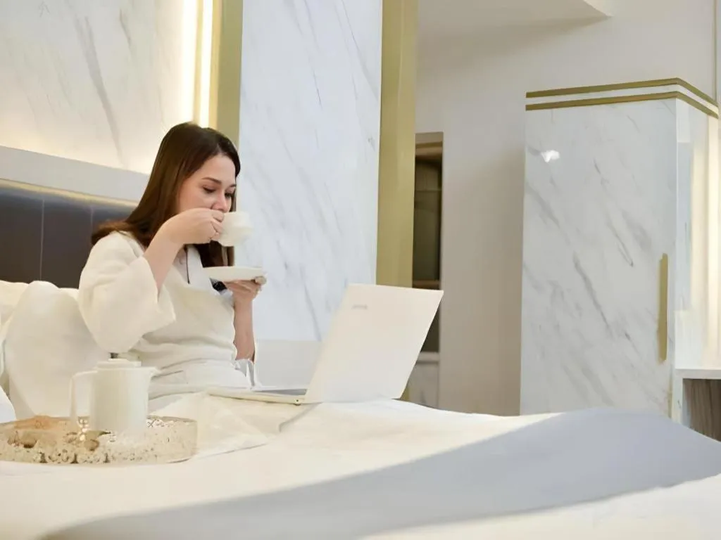 Bed in Grand Malioboro Yogyakarta