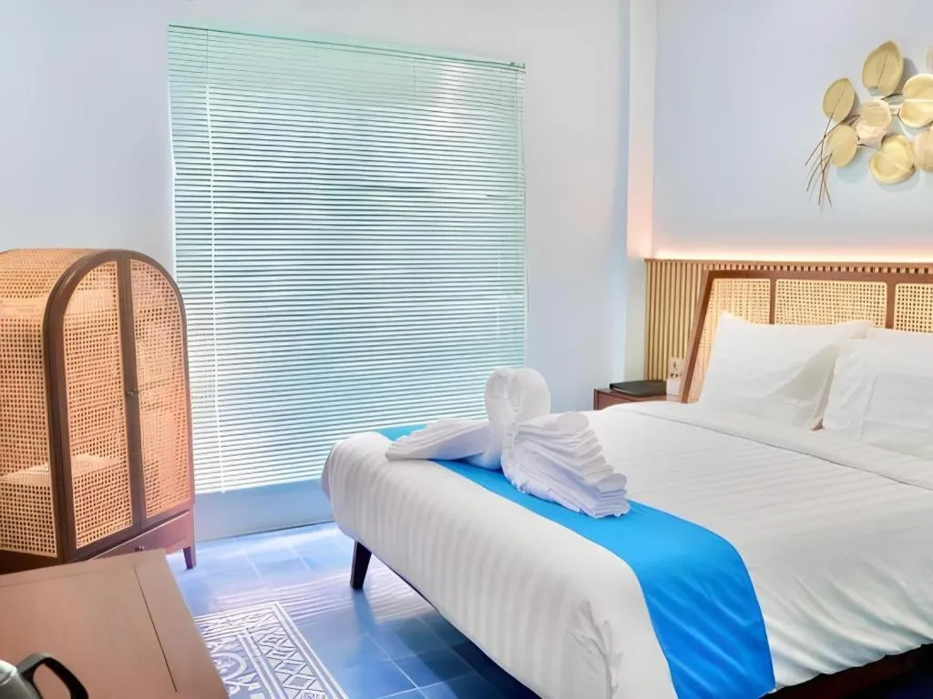 Bed in Grand Malioboro Yogyakarta