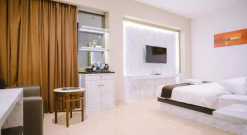 Bed in Grand Malioboro Yogyakarta