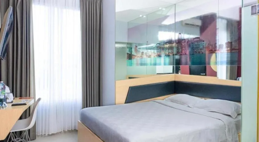 Bed in G Suites Hotel By AMITHYA