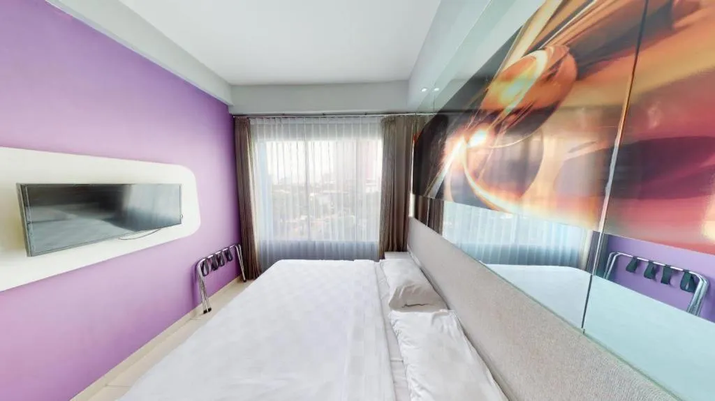 Bed in G Suites Hotel By AMITHYA