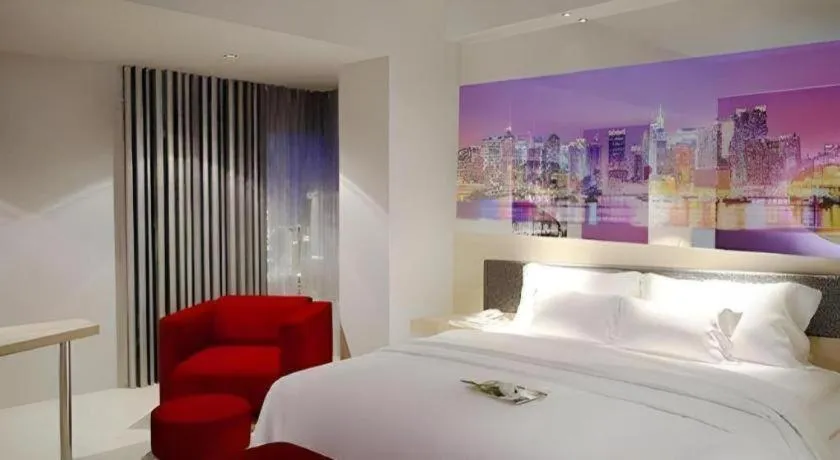 Bed in G Suites Hotel By AMITHYA