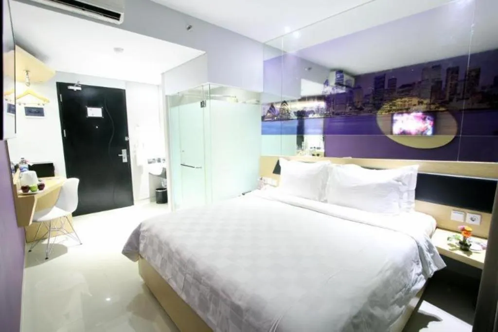 Bed in G Suites Hotel By AMITHYA