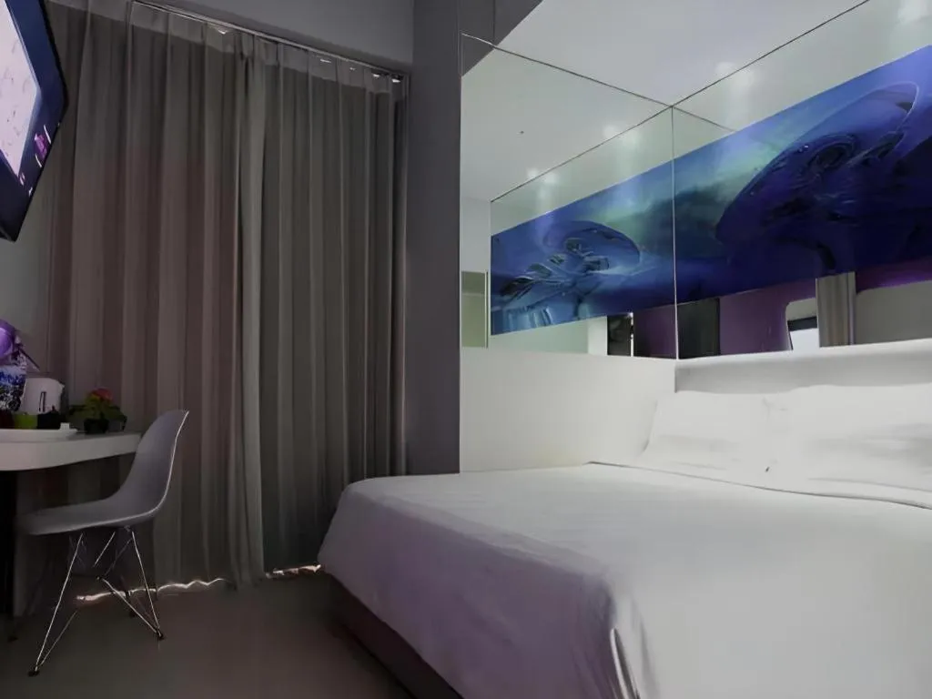 Bed in G Suites Hotel By AMITHYA