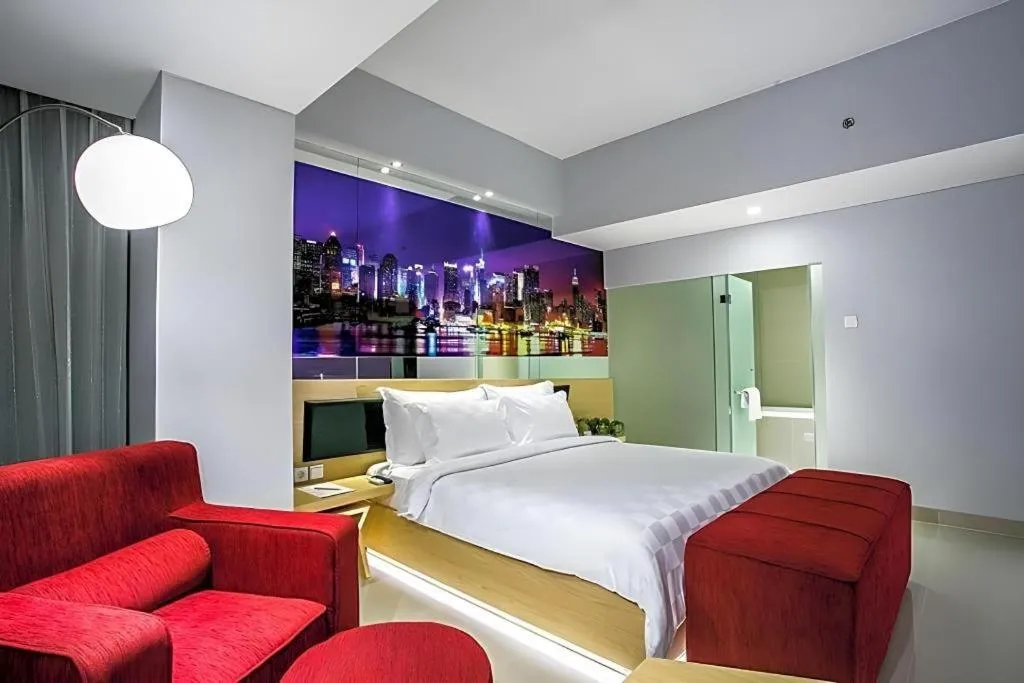 Bed in G Suites Hotel By AMITHYA