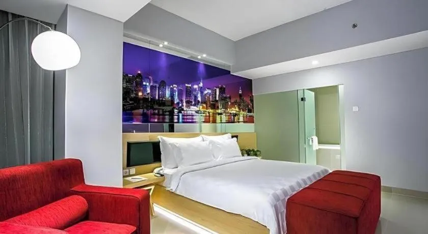 Bed in G Suites Hotel By AMITHYA