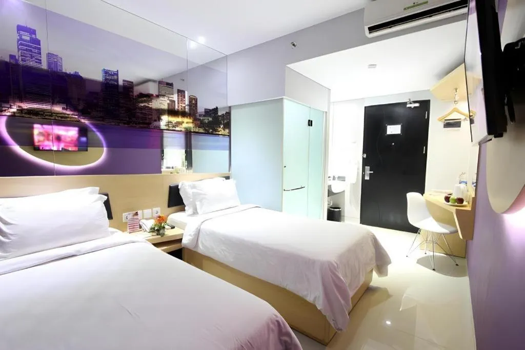 Bed in G Suites Hotel By AMITHYA