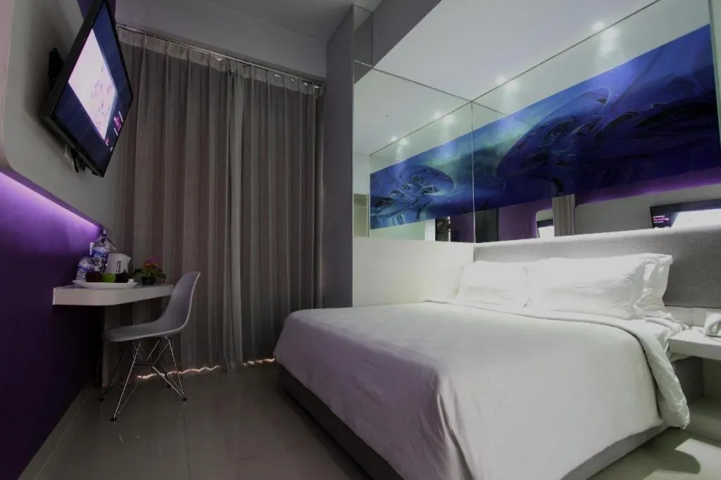 Bed in G Suites Hotel By AMITHYA