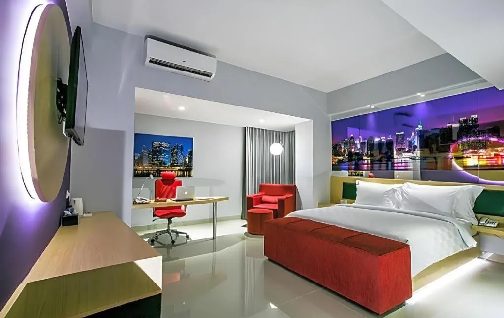 Bed in G Suites Hotel By AMITHYA