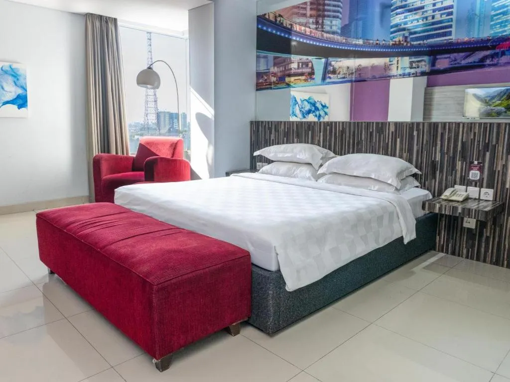 Bed in G Suites Hotel By AMITHYA