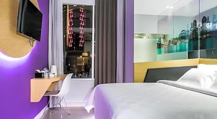 Bed in G Suites Hotel By AMITHYA