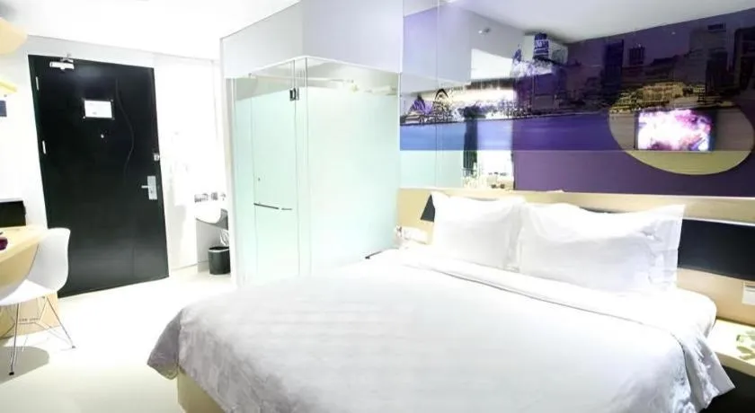 Bed in G Suites Hotel By AMITHYA