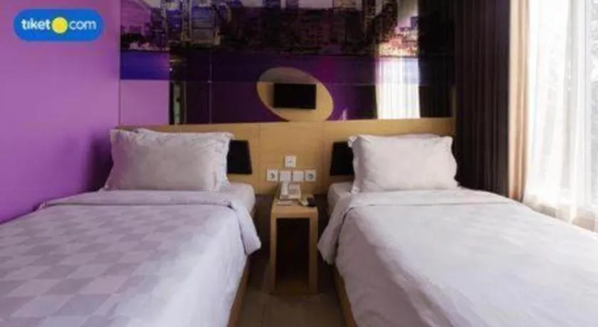 Bed in G Suites Hotel By AMITHYA