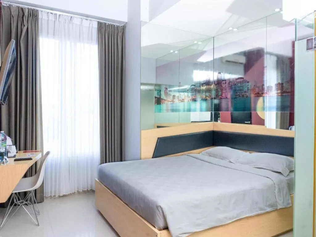 Bed in G Suites Hotel By AMITHYA