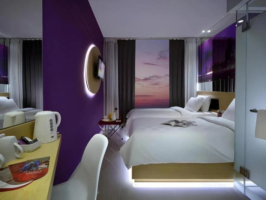 Bed in G Suites Hotel By AMITHYA