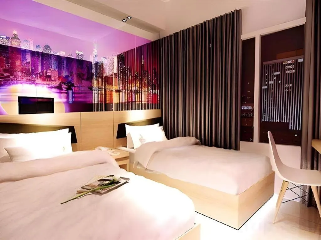 Bed in G Suites Hotel By AMITHYA