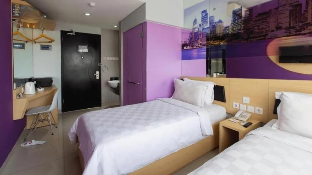 Bed in G Suites Hotel By AMITHYA