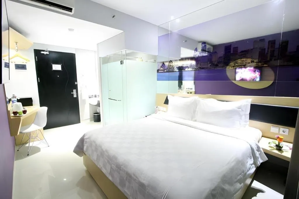 Bed in G Suites Hotel By AMITHYA