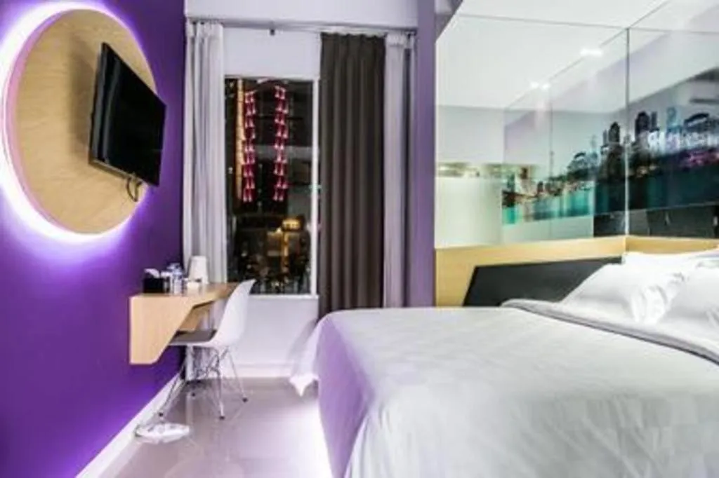 Bed in G Suites Hotel By AMITHYA