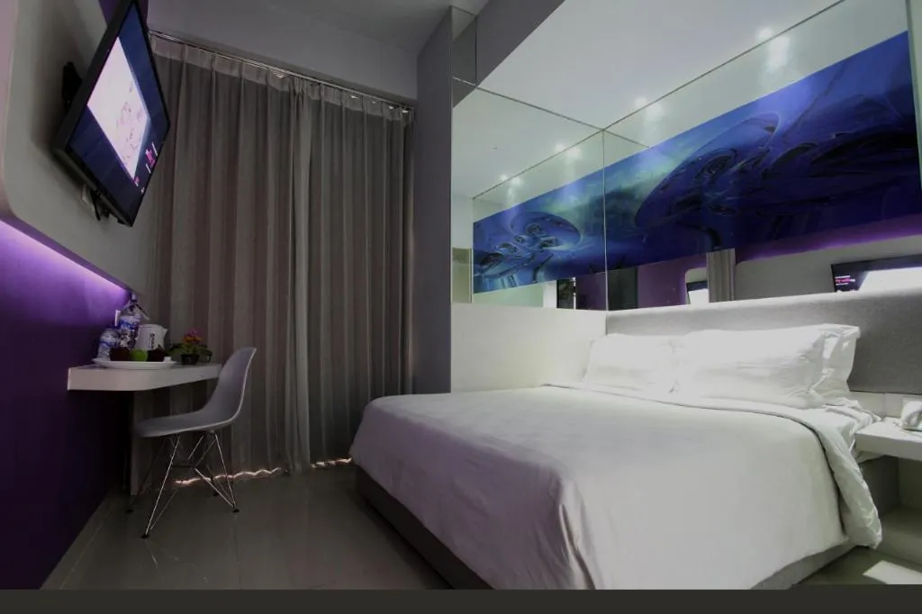 Bed in G Suites Hotel By AMITHYA