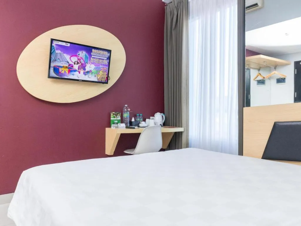 Bed in G Suites Hotel By AMITHYA