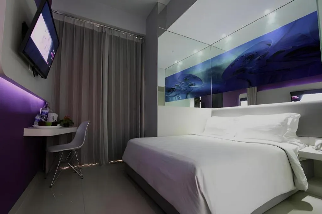 Bed in G Suites Hotel By AMITHYA