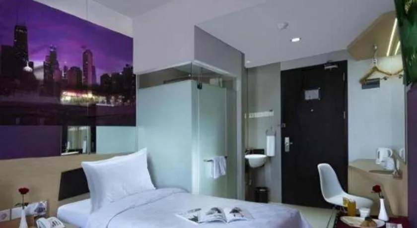Bed in G Suites Hotel By AMITHYA