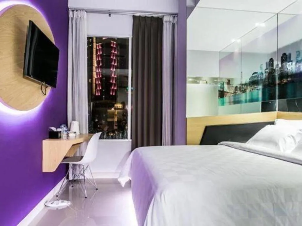 Bed in G Suites Hotel By AMITHYA