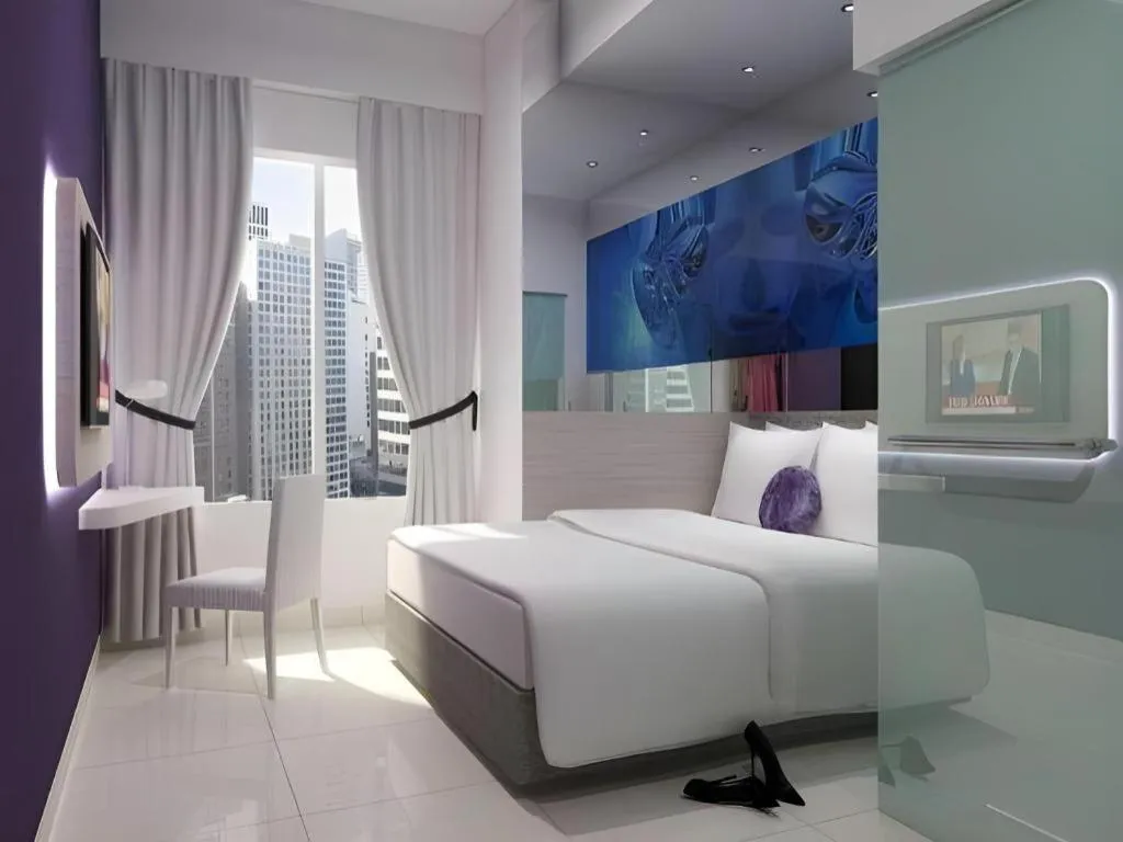 Bed in G Suites Hotel By AMITHYA