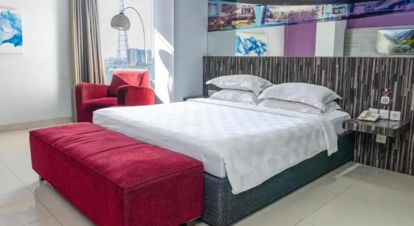 Bed in G Suites Hotel By AMITHYA