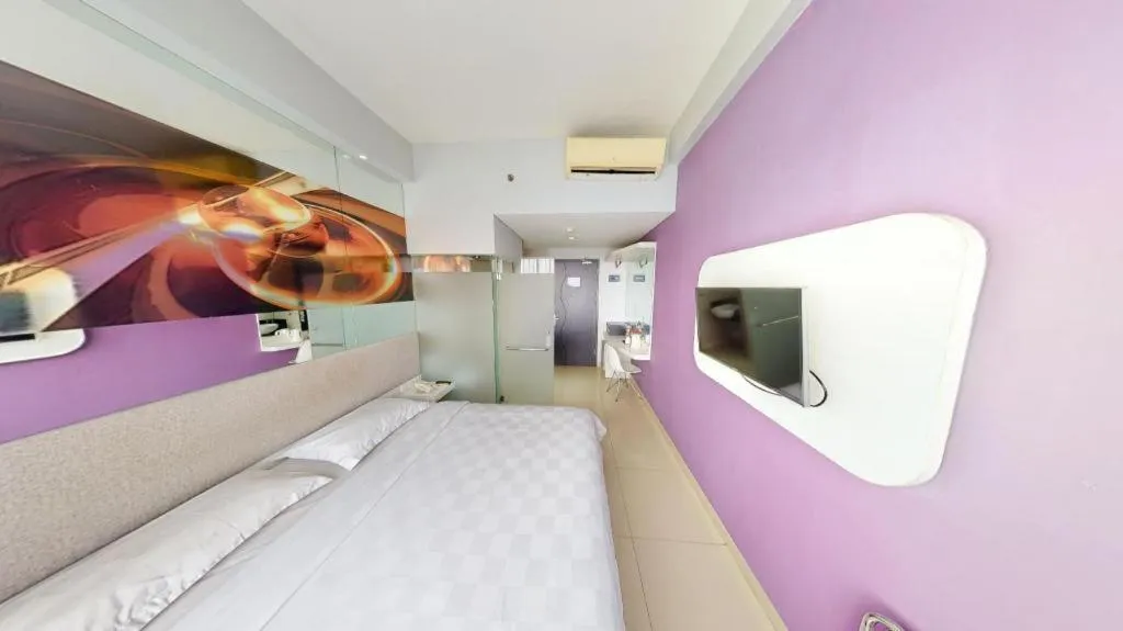 Bed in G Suites Hotel By AMITHYA