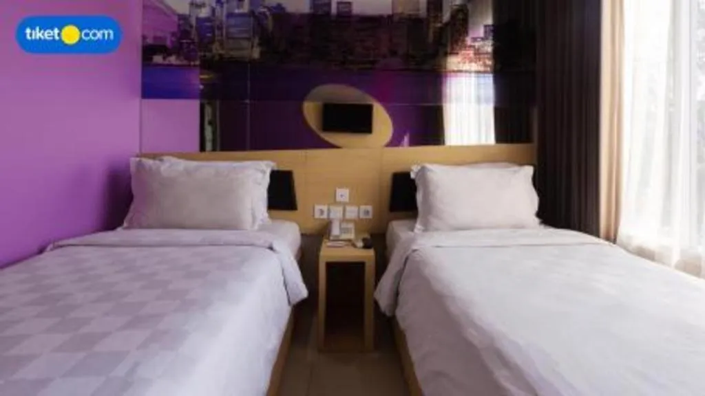 Bed in G Suites Hotel By AMITHYA