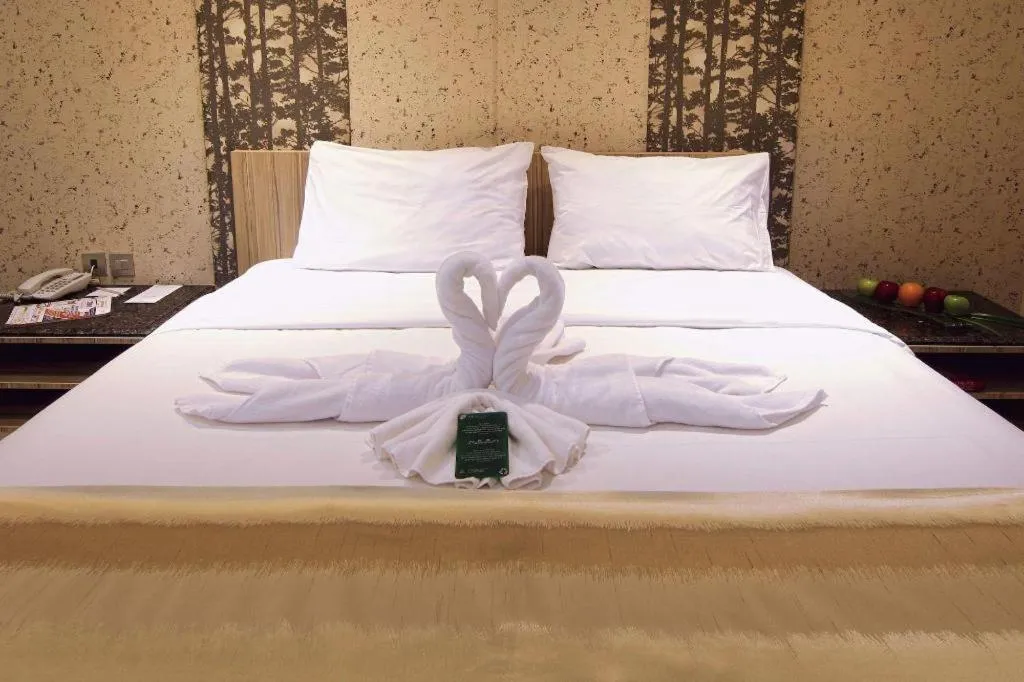 Bed in HW Hotel Padang