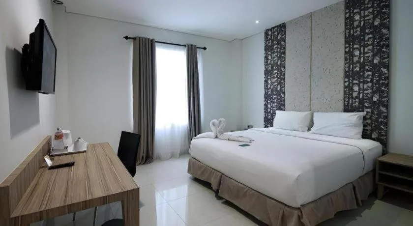 Bed in HW Hotel Padang