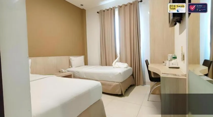 Bed in HW Hotel Padang