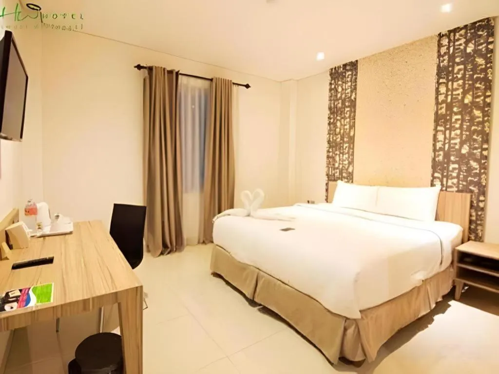 Bed in HW Hotel Padang
