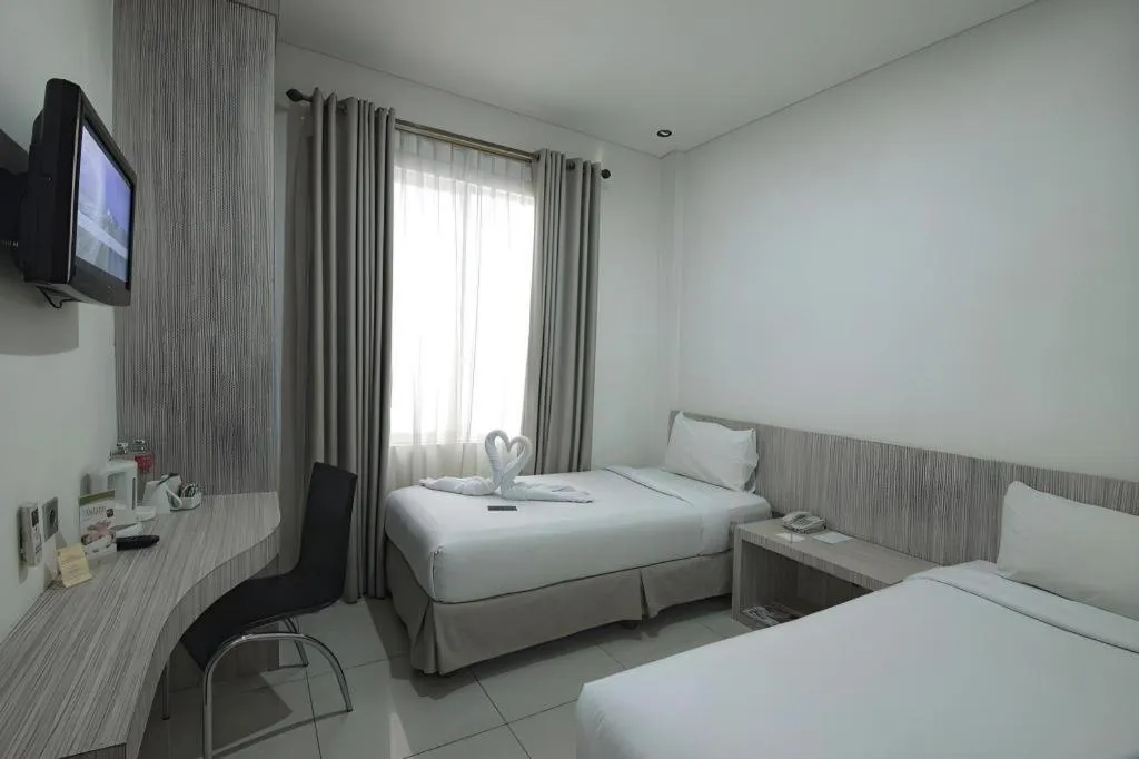 Bed in HW Hotel Padang