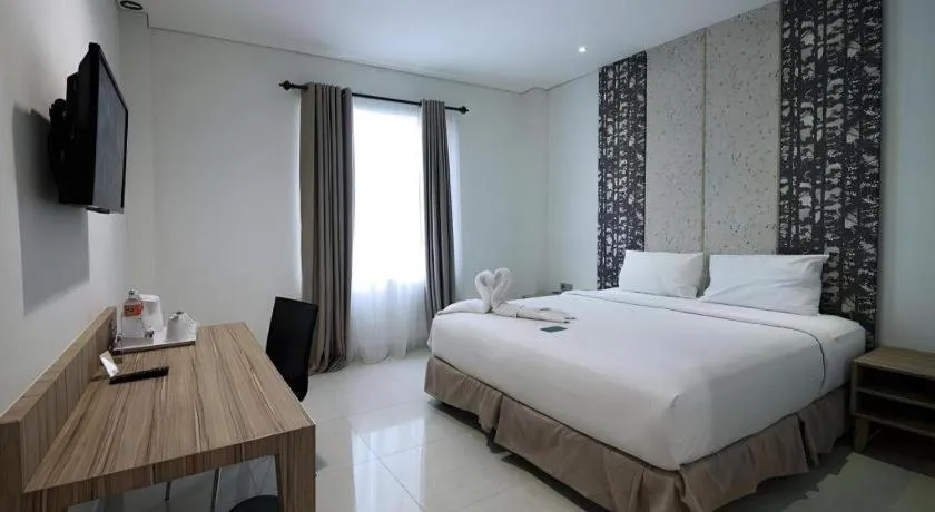 Bed in HW Hotel Padang
